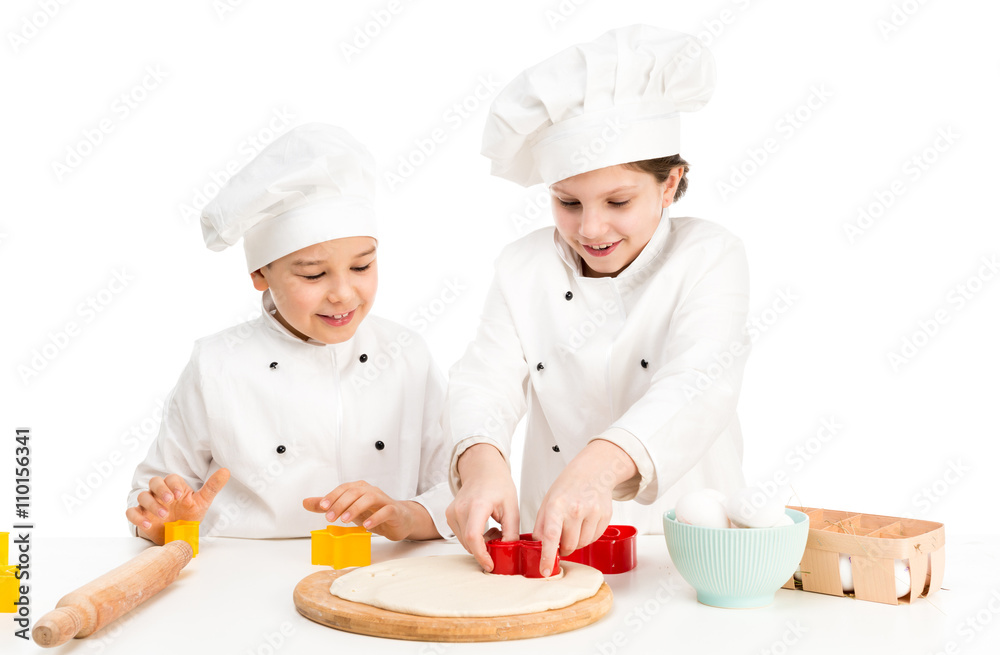 children-cooks playing forms for dought cutting children-cooks playing forms for dought cutting