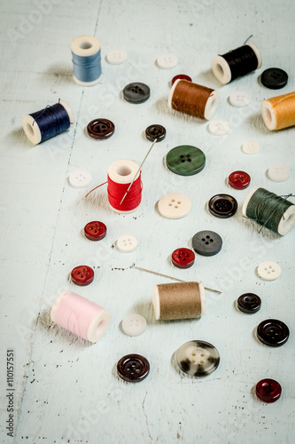 Vintage background with sewing tools and sewing kit