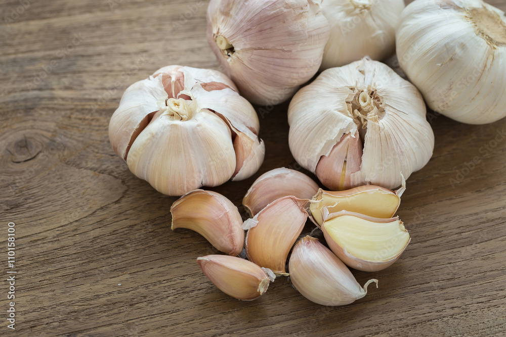 Fresh Garlic on the Wooden Table. Selective focus Fresh Garlic on the Wooden Table. Selective focus