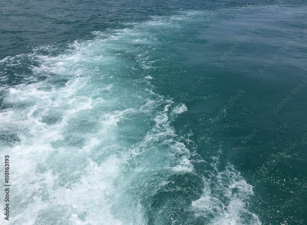 Fototapeta premium Speed boats trace tail on the blue sea