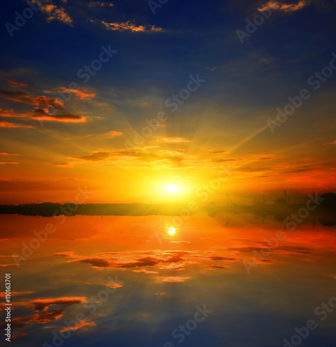 Nice sunset over water © Pavlo Klymenko