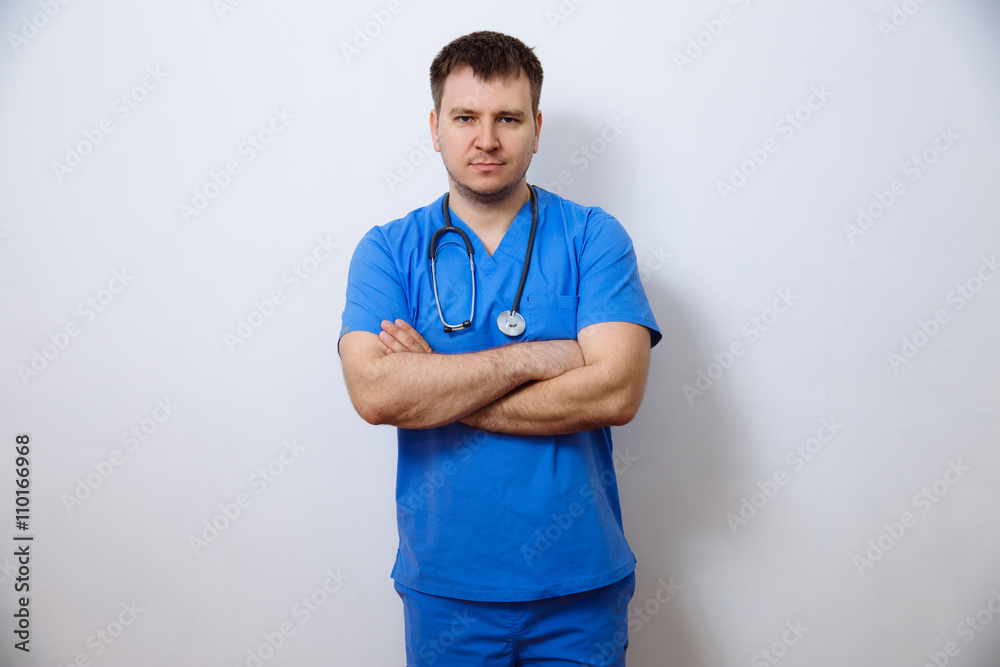 portrait of adult doctor in medical uniform on white background portrait of adult doctor in medical uniform on white background