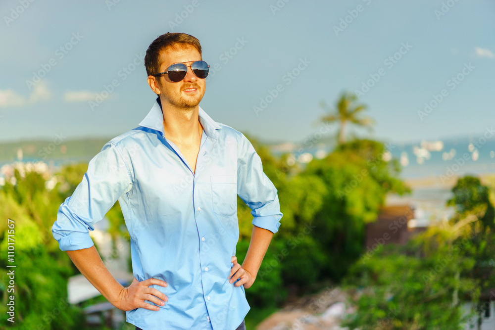 Portrait of a handsome young man with sunglasses. Portrait of a handsome young man with sunglasses.