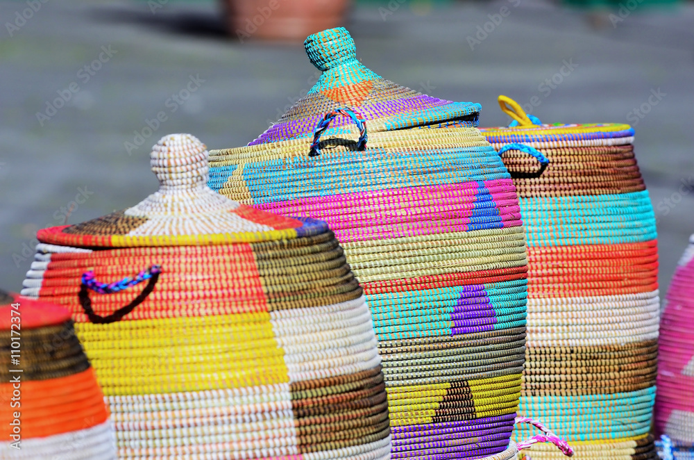 Fototapeta premium A lot of baskets of sea grass made by women in Africa from Senegal, Congo, and Angola