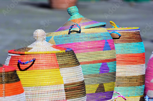 A lot of baskets of sea grass made by women in Africa from Senegal, Congo, and Angola photo