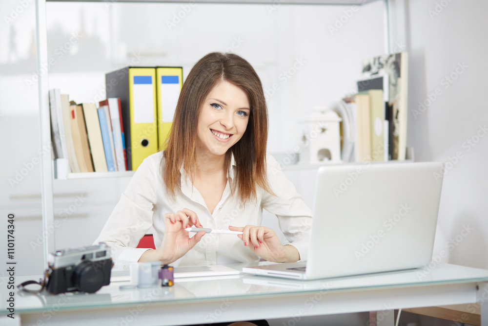 woman photographer working in studio woman photographer working in studio