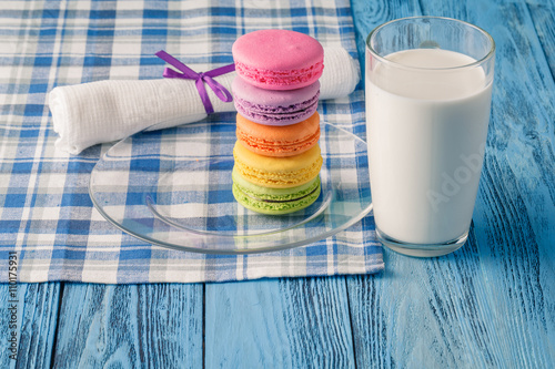 Colorful macaroons and glss of milk photo