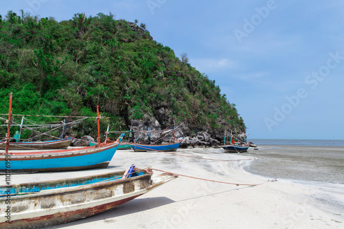 Old fishing boat on a beach © nick6688