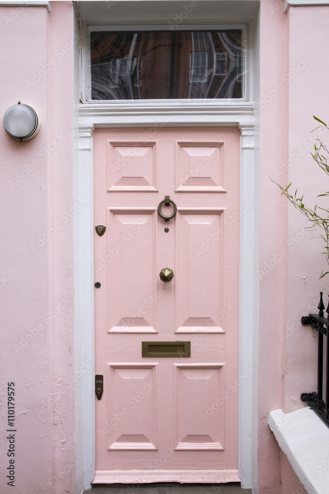 Fototapeta premium Pink door in typical London house