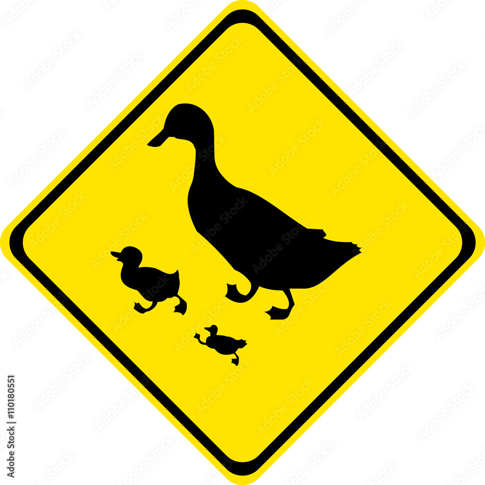 Road sign warning about the possible presence of animals on the road and in close proximity to  