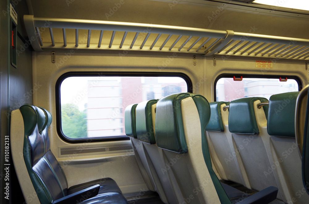 Naklejka premium View of commuter train seats passenger perspective