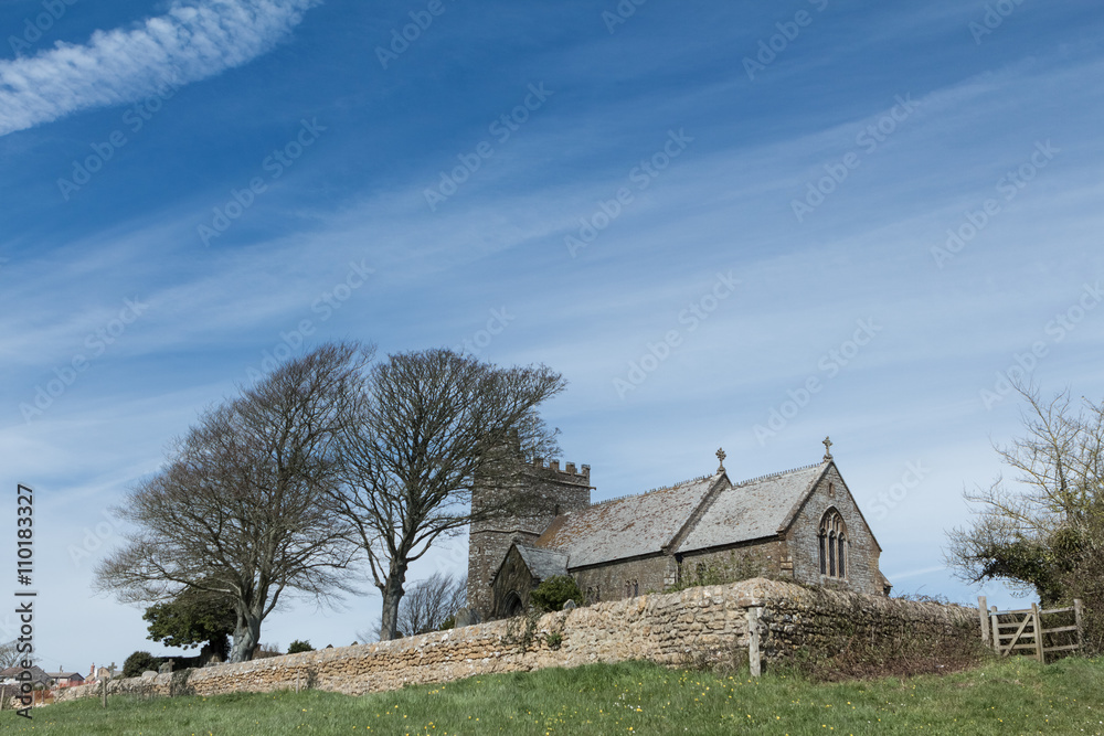 English church on hill in countryside by village of Shipton Gorg English church on hill in countryside by village of Shipton Gorg