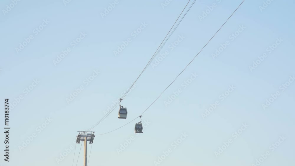 View of The Cable Car Public Transport. Cable Cars On Blue Sky Background. View of The Cable Car Public Transport. Cable Cars On Blue Sky Background.