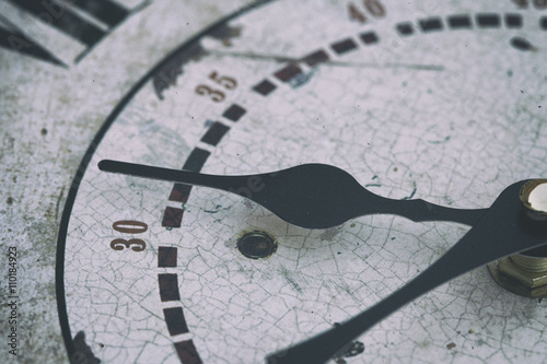 Close-up of black pointers on clock