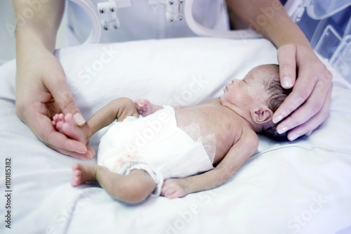 Nurse and premature baby