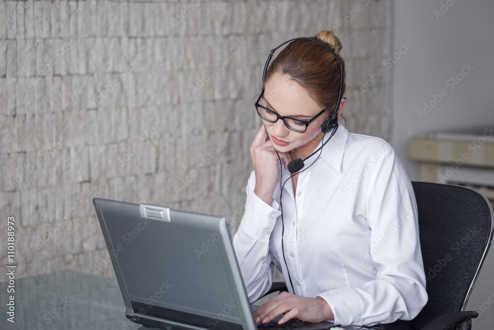 Female customer support emloyee talking online Female customer support emloyee talking online