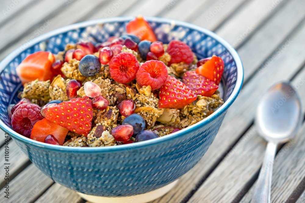 delicious and colorful bowl of granola and fresh berries delicious and colorful bowl of granola and fresh berries