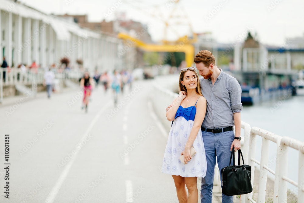 Happy couple walking outdoors Happy couple walking outdoors