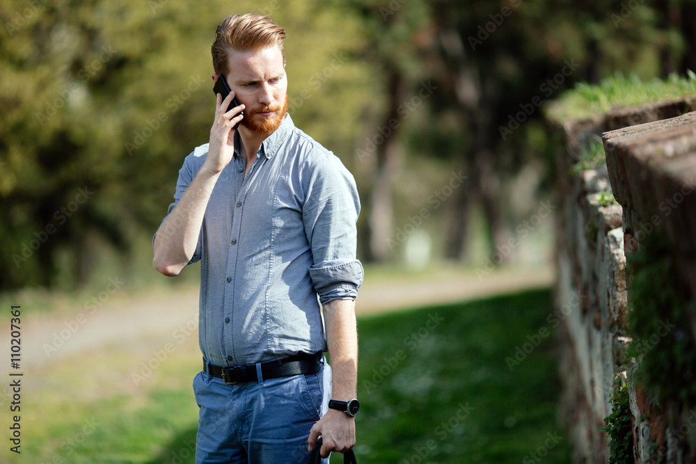 Businessman relaxing outdoors