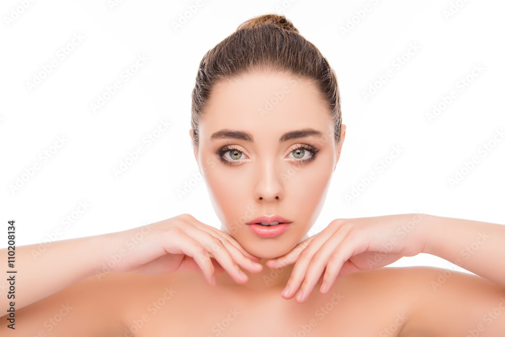 Close up portrait of sensitive young woman touching her chin Close up portrait of sensitive young woman touching her chin