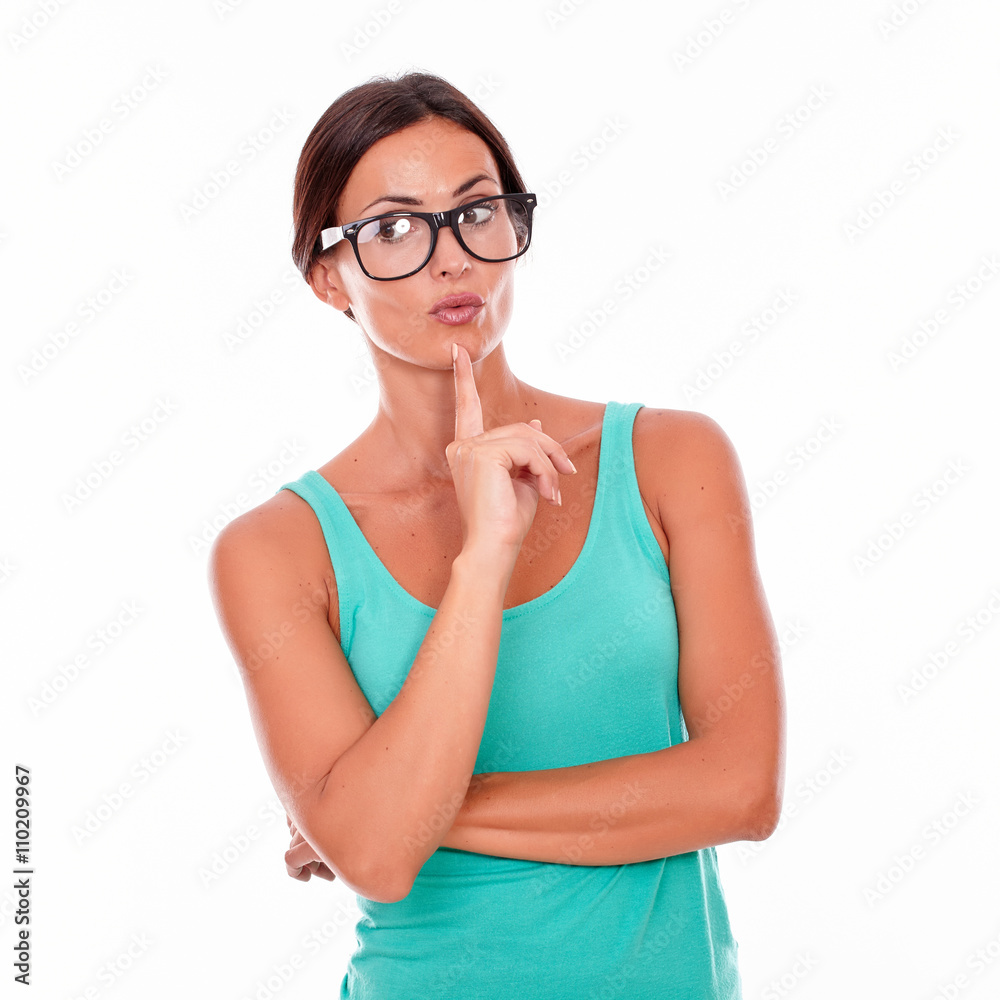Planning brunette woman with green tank top Planning brunette woman with green tank top