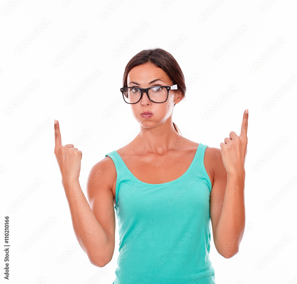 Pointing brunette woman with green tank top Pointing brunette woman with green tank top