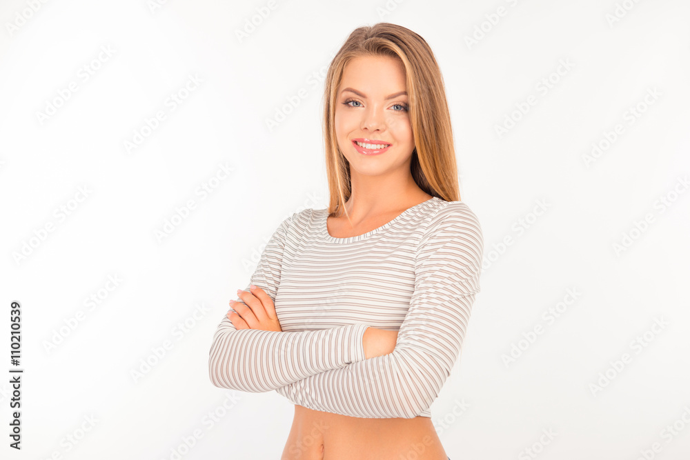 Happy pretty young girl crossed hands Happy pretty young girl crossed hands
