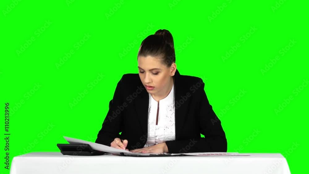 Business woman working from office with documents. Green screen Business woman working from office with documents. Green screen