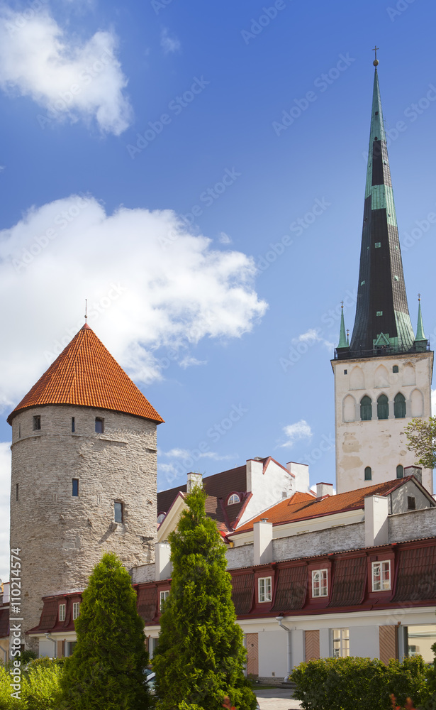 Medieval towers - part of the city wall and St Olaf (Oleviste) Church. Tallinn, Estonia
