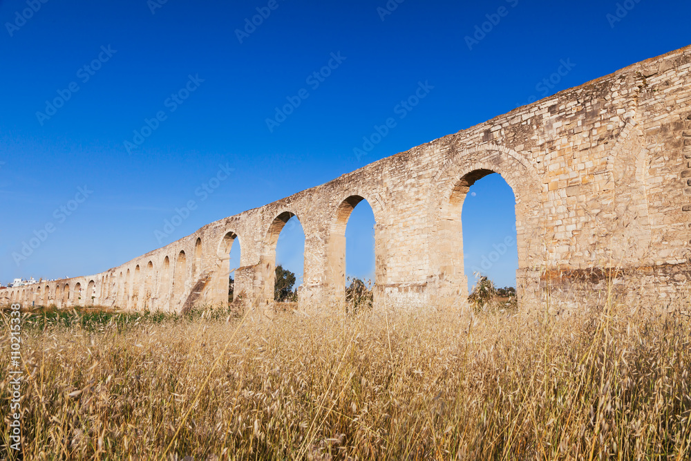 Kamares Aqueduct, Bekir Pasha Aqueduct. Larnaca, Cyprus. Sunset panorama landscape