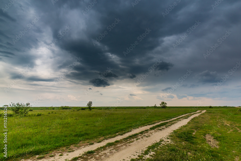 Stormy sky over natural wild river