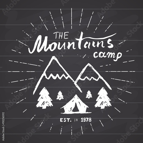 Mountains handdrawn sketch emblem. outdoor camping and hiking activity, Extreme sports, outdoor adventure symbol, vector illustration on chalkboard background