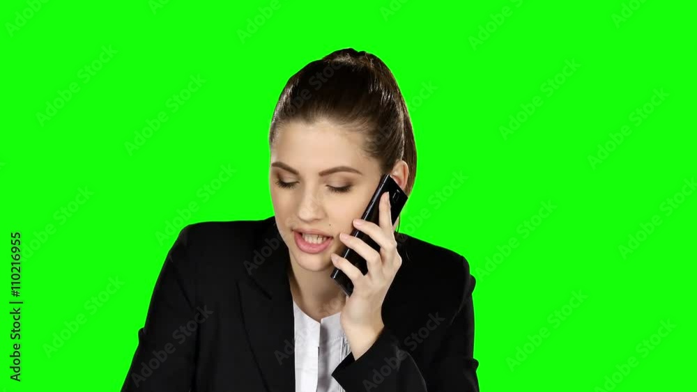 Happy businesswoman speaking at the phone. Green screen Happy businesswoman speaking at the phone. Green screen