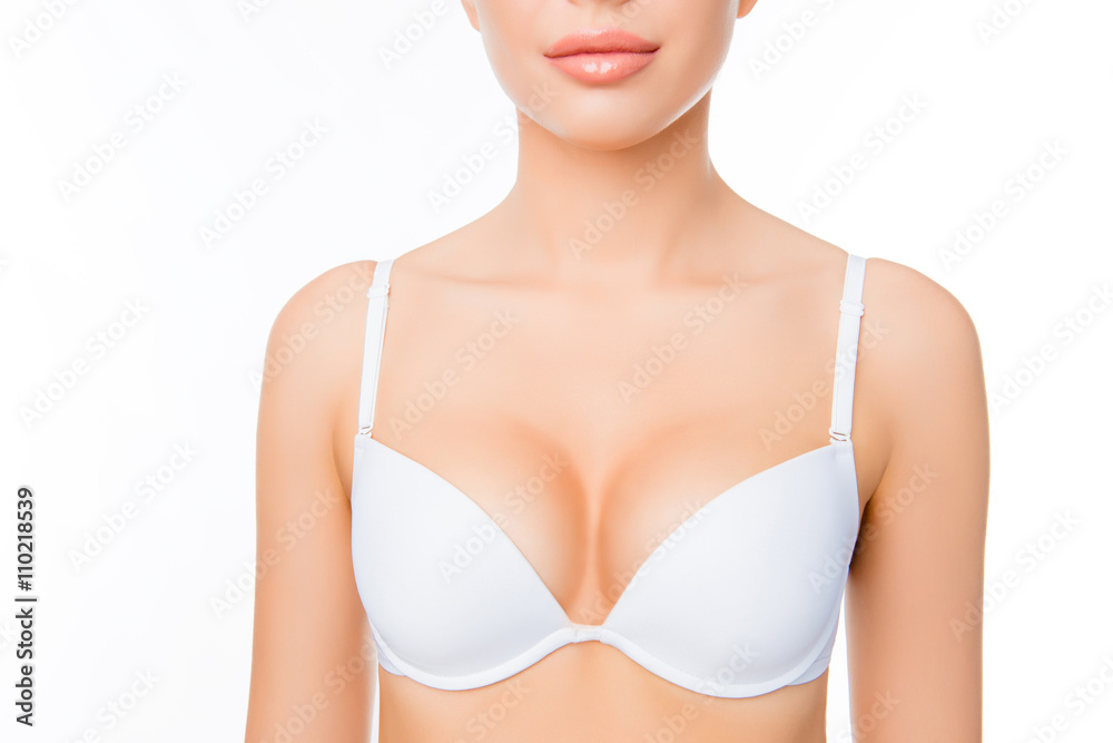 Close up portrait of shapely sexy woman in white bra