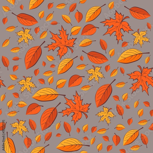 Seamless pattern with autumn leaves on grey background