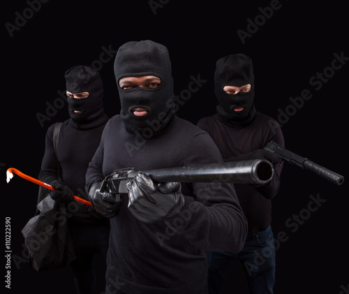 Robbers with rifle photo