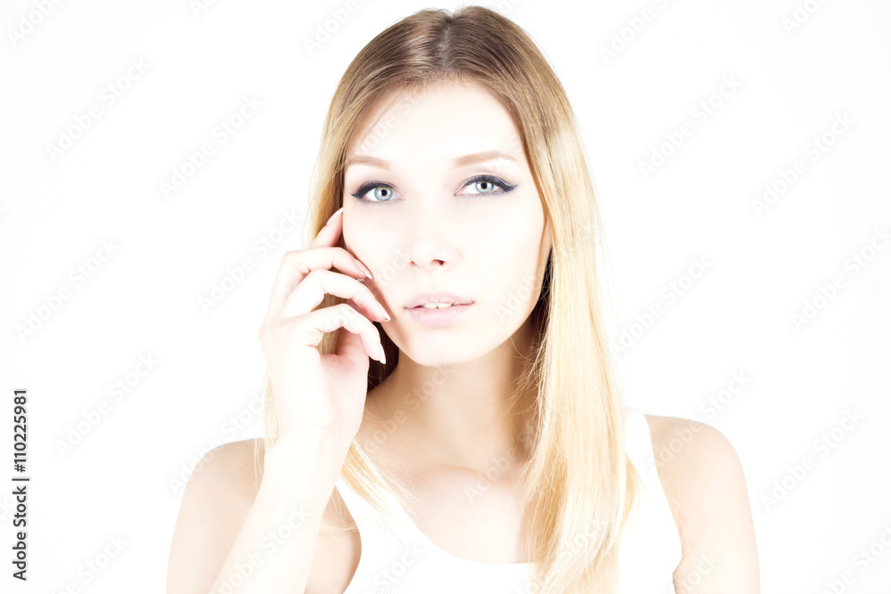 Beautiful woman with a permanent make-up touch her face. Beauty blonde. Beautiful woman with a permanent make-up touch her face. Beauty blonde.