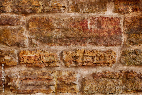 Old brick wall. applied color and lighting effects for textured background. 