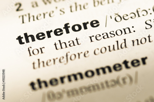 Close up of old English dictionary page with word therefore