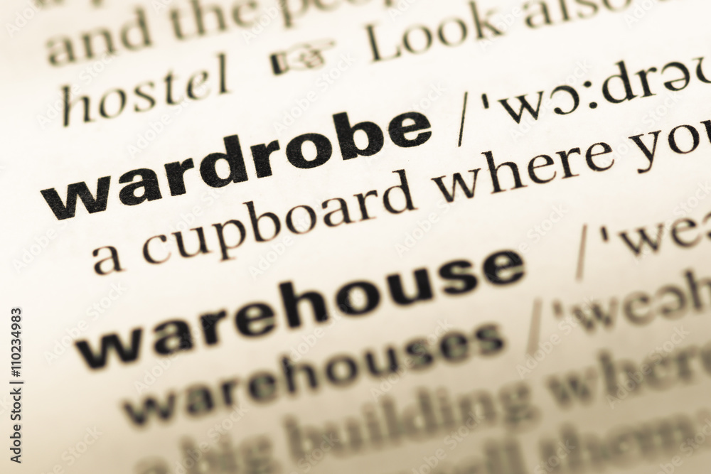 Close up of old English dictionary page with word wardrobe Close up of old English dictionary page with word wardrobe