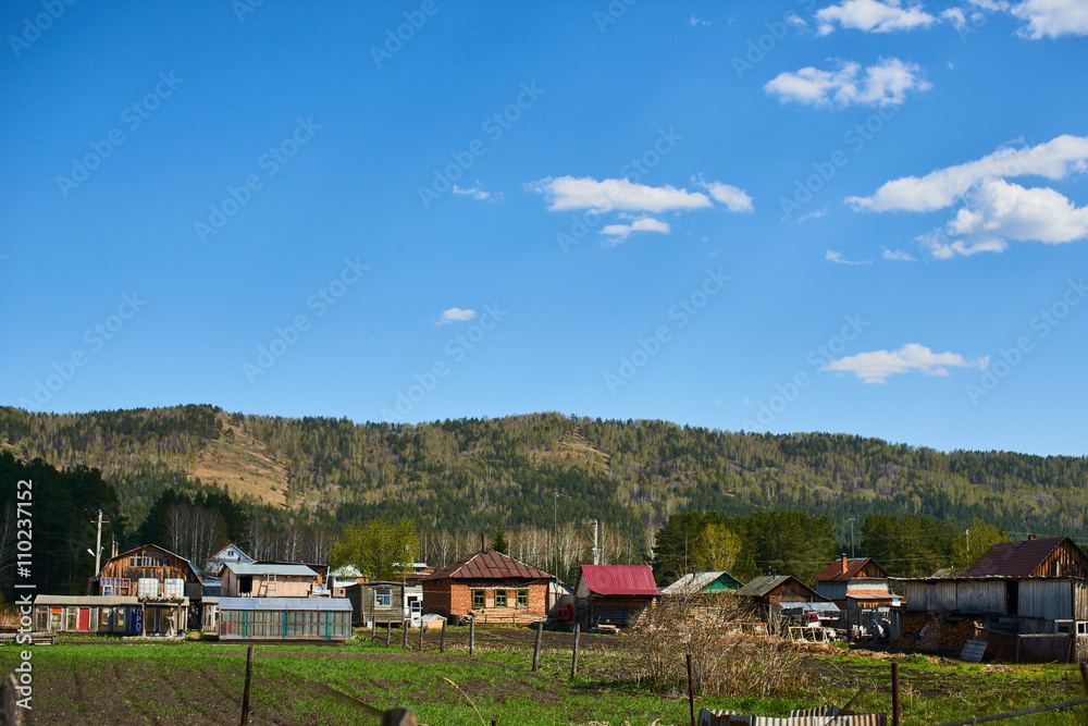 A village house at the foot of the mountains