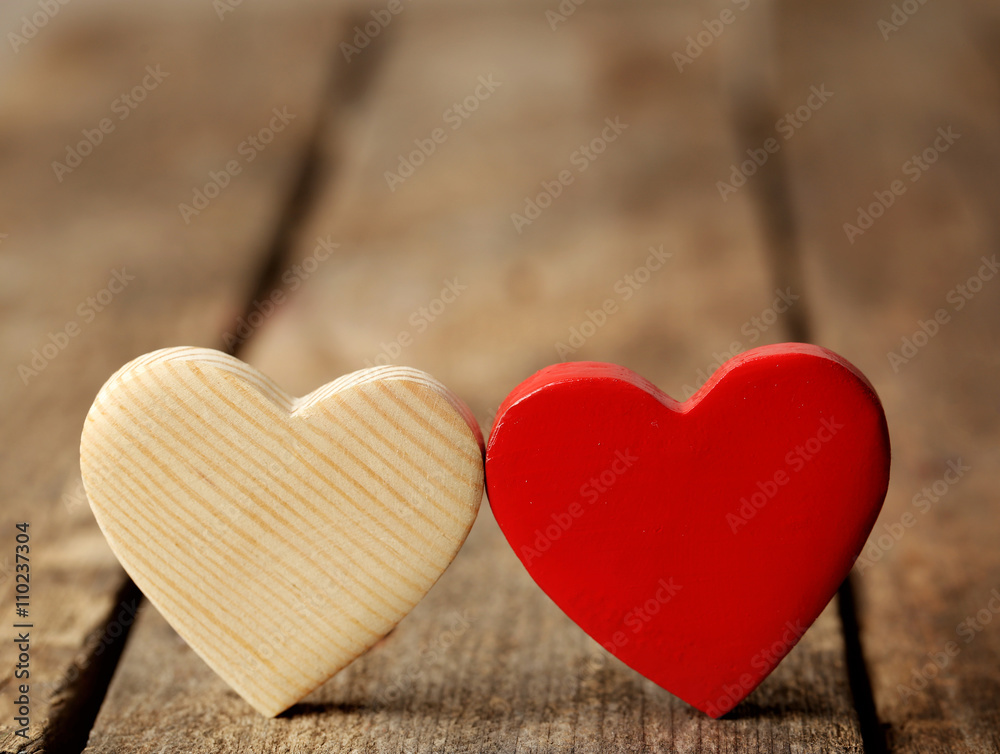 Wooden hearts on rustic wooden background Wooden hearts on rustic wooden background