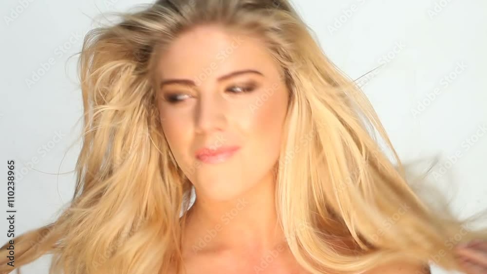 pretty blonde woman happy smiling with the wind pretty blonde woman happy smiling with the wind