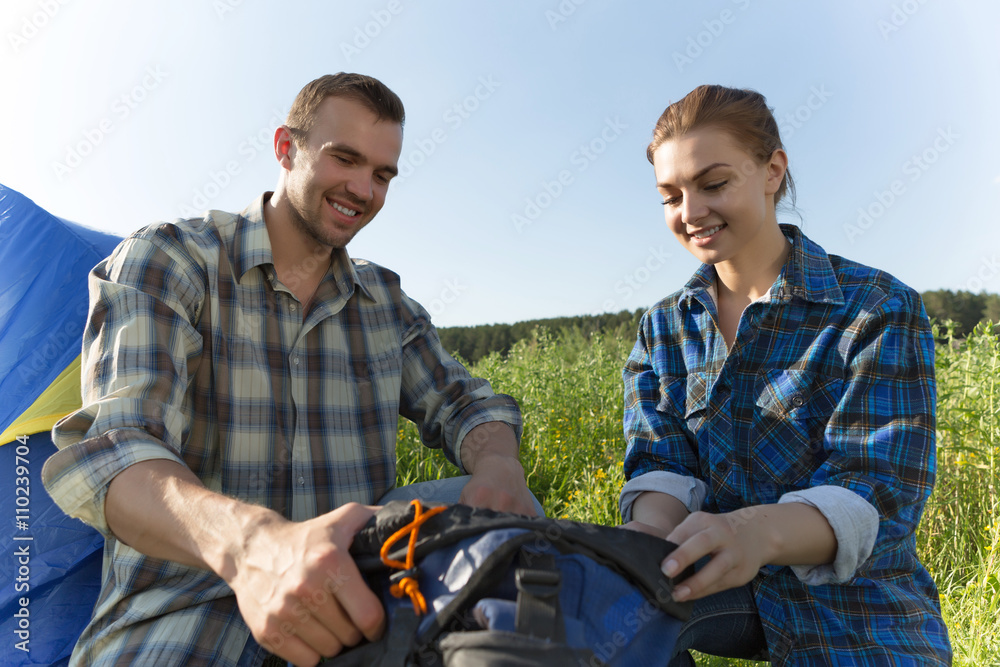 Couple camping in the forest Couple camping in the forest
