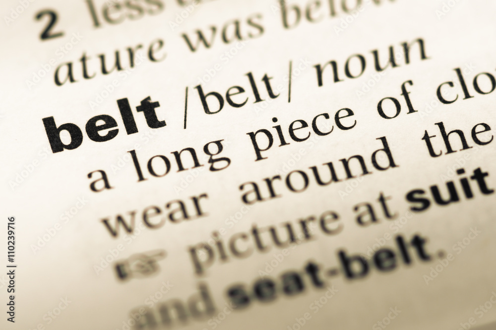Close up of old English dictionary page with word belt Close up of old English dictionary page with word belt
