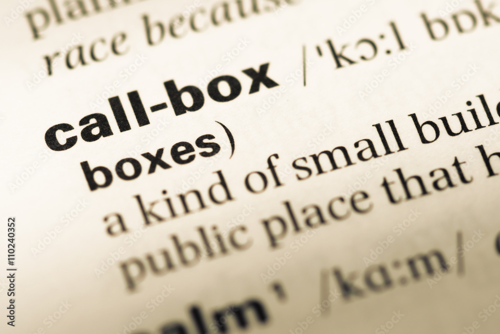 Close up of old English dictionary page with word call box Close up of old English dictionary page with word call box