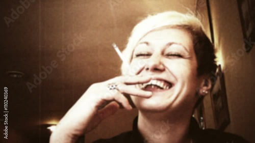 1970's styled clip - WOMEN SMILING, SMOKING AND TALKING
