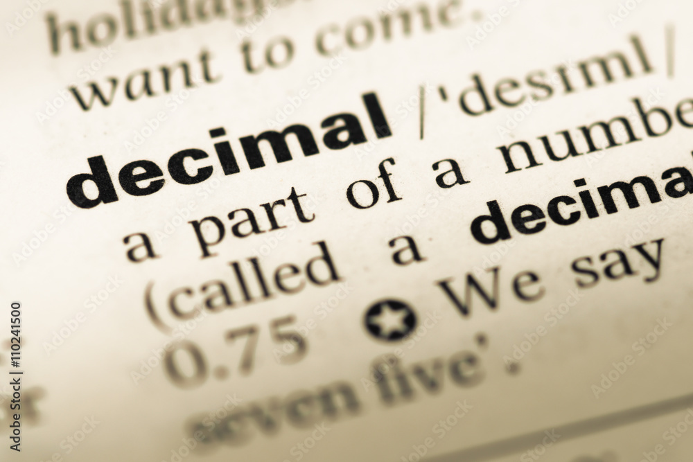 Close up of old English dictionary page with word decimal Close up of old English dictionary page with word decimal