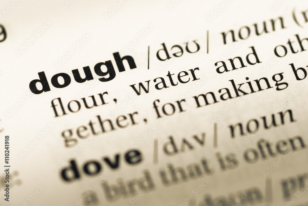 Close up of old English dictionary page with word dough Close up of old English dictionary page with word dough
