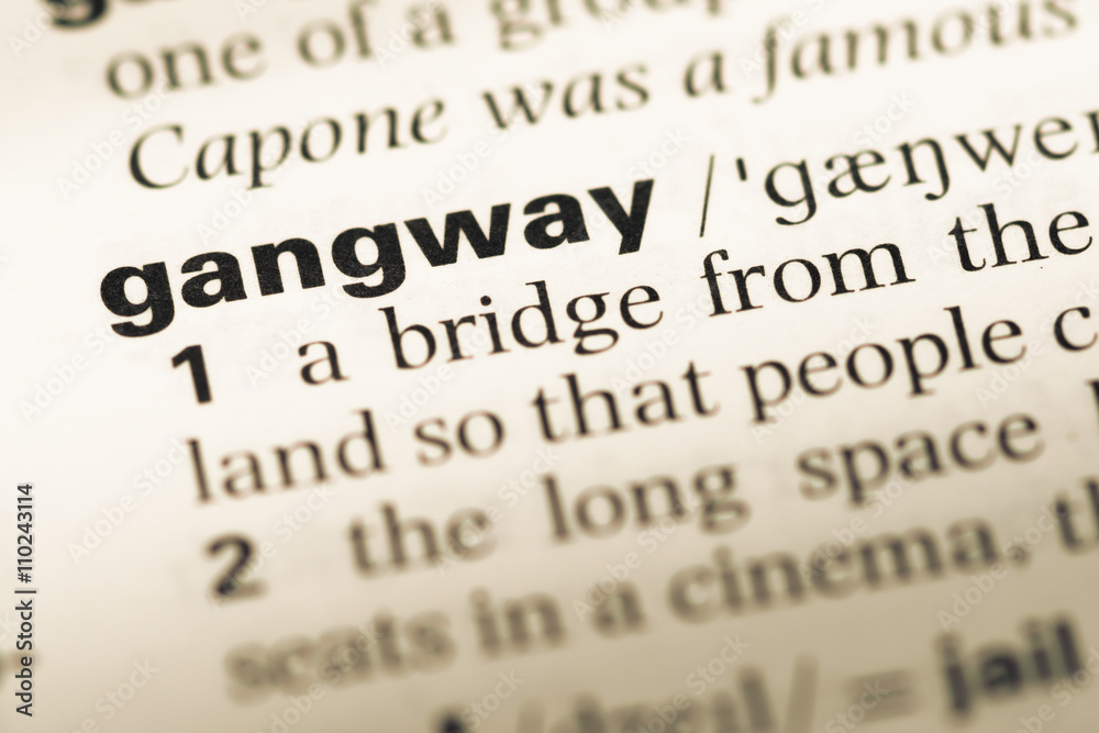 Close up of old English dictionary page with word gangway Close up of old English dictionary page with word gangway